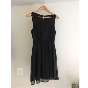 Black chiffon dress with silver threads details